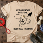 MY DOG KNOWS EVERYONE. I JUST HOLD THE LEASH. Tee