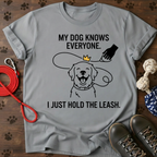 MY DOG KNOWS EVERYONE. I JUST HOLD THE LEASH. Tee